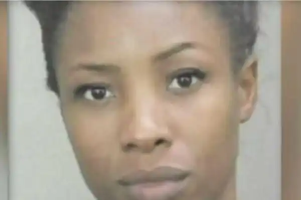 Woman Burns 9-year-old son